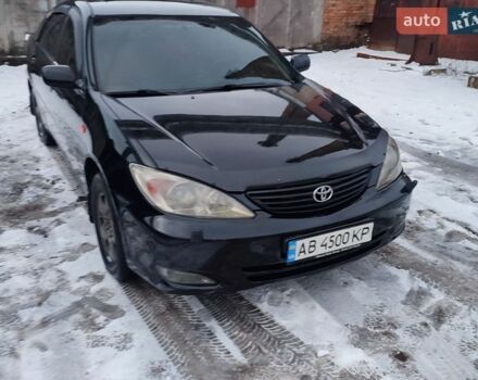 Черный Тойота Камри, объемом двигателя 3 л и пробегом 370 тыс. км за 6000 $, фото 1 на Automoto.ua