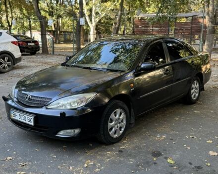 Чорний Тойота Камрі, об'ємом двигуна 2.4 л та пробігом 349 тис. км за 4800 $, фото 1 на Automoto.ua