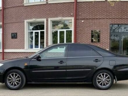 Чорний Тойота Камрі, об'ємом двигуна 2.5 л та пробігом 293 тис. км за 7000 $, фото 1 на Automoto.ua