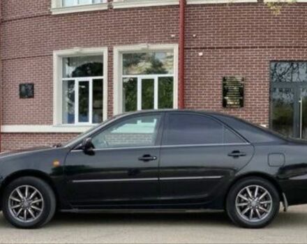 Чорний Тойота Камрі, об'ємом двигуна 2.5 л та пробігом 293 тис. км за 7000 $, фото 1 на Automoto.ua