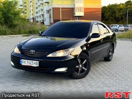 Чорний Тойота Камрі, об'ємом двигуна 3 л та пробігом 230 тис. км за 5700 $, фото 1 на Automoto.ua