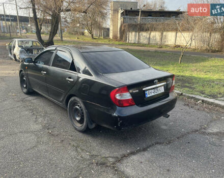 Черный Тойота Камри, объемом двигателя 2.36 л и пробегом 270 тыс. км за 2900 $, фото 1 на Automoto.ua