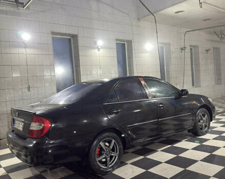 Чорний Тойота Камрі, об'ємом двигуна 2.36 л та пробігом 527 тис. км за 5400 $, фото 1 на Automoto.ua