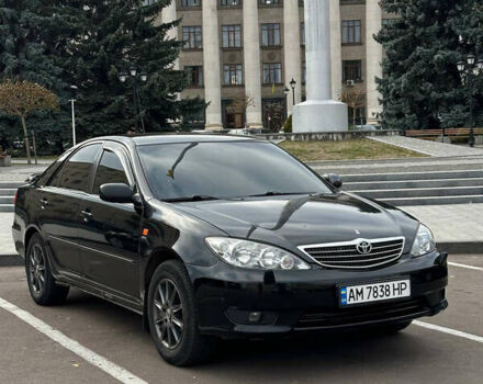 Черный Тойота Камри, объемом двигателя 2.36 л и пробегом 450 тыс. км за 4200 $, фото 1 на Automoto.ua