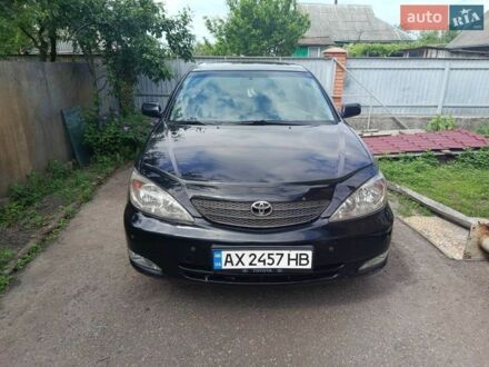 Чорний Тойота Камрі, об'ємом двигуна 3 л та пробігом 237 тис. км за 4350 $, фото 1 на Automoto.ua