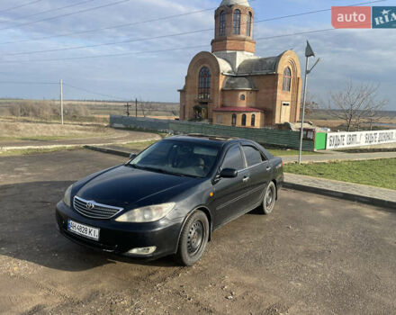 Чорний Тойота Камрі, об'ємом двигуна 2.36 л та пробігом 270 тис. км за 2900 $, фото 1 на Automoto.ua