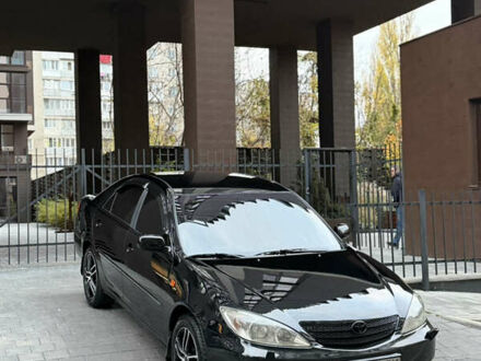 Чорний Тойота Камрі, об'ємом двигуна 2.36 л та пробігом 353 тис. км за 6500 $, фото 1 на Automoto.ua