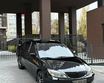 Черный Тойота Камри, объемом двигателя 2.36 л и пробегом 353 тыс. км за 6500 $, фото 1 на Automoto.ua