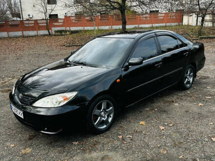 Черный Тойота Камри, объемом двигателя 3 л и пробегом 301 тыс. км за 4500 $, фото 1 на Automoto.ua