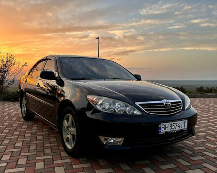 Черный Тойота Камри, объемом двигателя 3 л и пробегом 285 тыс. км за 6500 $, фото 1 на Automoto.ua
