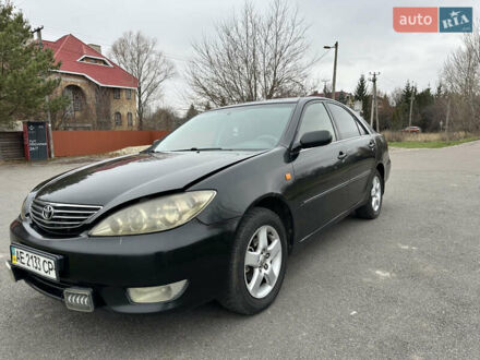 Черный Тойота Камри, объемом двигателя 2.4 л и пробегом 553 тыс. км за 5100 $, фото 1 на Automoto.ua