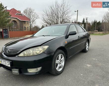 Черный Тойота Камри, объемом двигателя 2.4 л и пробегом 553 тыс. км за 5100 $, фото 1 на Automoto.ua