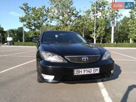 Чорний Тойота Камрі, об'ємом двигуна 2.36 л та пробігом 390 тис. км за 6800 $, фото 1 на Automoto.ua