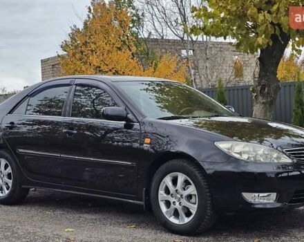 Тойота Камри 2004 в Каменское - Днепродзержинск на Automoto.ua Черный Тойота Камри, объемом двигателя 2 л и пробегом 180 тыс. км за 6700 $, фото 1 на Automoto.ua