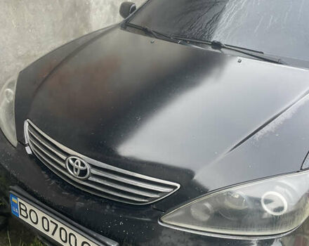 Черный Тойота Камри, объемом двигателя 3 л и пробегом 200 тыс. км за 5800 $, фото 1 на Automoto.ua