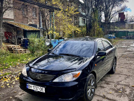 Чорний Тойота Камрі, об'ємом двигуна 3 л та пробігом 340 тис. км за 6700 $, фото 1 на Automoto.ua