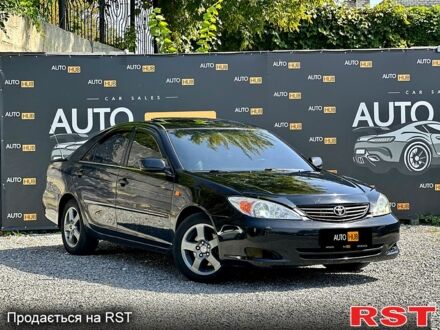 Черный Тойота Камри, объемом двигателя 3 л и пробегом 231 тыс. км за 5000 $, фото 1 на Automoto.ua