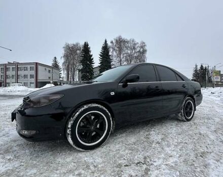 Черный Тойота Камри, объемом двигателя 3 л и пробегом 500 тыс. км за 6400 $, фото 1 на Automoto.ua