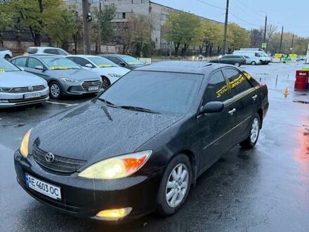 Чорний Тойота Камрі, об'ємом двигуна 3 л та пробігом 392 тис. км за 5999 $, фото 1 на Automoto.ua