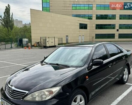 Черный Тойота Камри, объемом двигателя 2.37 л и пробегом 284 тыс. км за 5700 $, фото 1 на Automoto.ua
