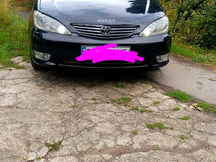 Чорний Тойота Камрі, об'ємом двигуна 3 л та пробігом 270 тис. км за 5999 $, фото 1 на Automoto.ua