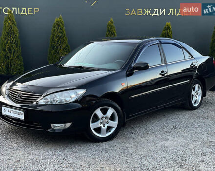 Черный Тойота Камри, объемом двигателя 3 л и пробегом 200 тыс. км за 7990 $, фото 1 на Automoto.ua