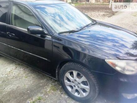 Чорний Тойота Камрі, об'ємом двигуна 3 л та пробігом 208 тис. км за 6700 $, фото 1 на Automoto.ua