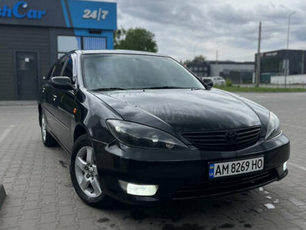 Чорний Тойота Камрі, об'ємом двигуна 2.4 л та пробігом 288 тис. км за 5900 $, фото 1 на Automoto.ua