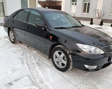 Черный Тойота Камри, объемом двигателя 2.4 л и пробегом 85 тыс. км за 10900 $, фото 1 на Automoto.ua