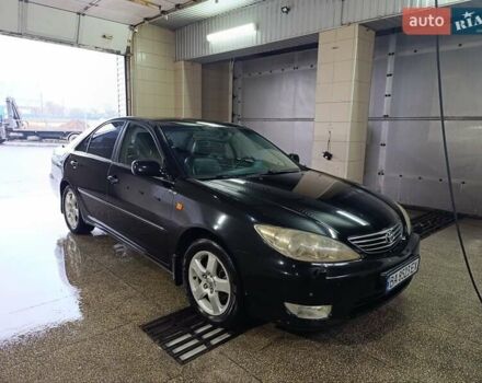 Черный Тойота Камри, объемом двигателя 3 л и пробегом 210 тыс. км за 7200 $, фото 1 на Automoto.ua