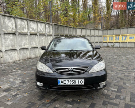 Черный Тойота Камри, объемом двигателя 2.4 л и пробегом 326 тыс. км за 6300 $, фото 1 на Automoto.ua