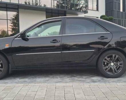 Чорний Тойота Камрі, об'ємом двигуна 2.36 л та пробігом 335 тис. км за 5000 $, фото 1 на Automoto.ua