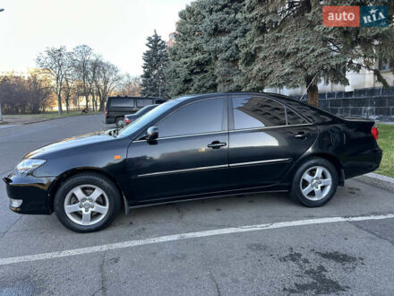 Черный Тойота Камри, объемом двигателя 3 л и пробегом 304 тыс. км за 7000 $, фото 1 на Automoto.ua