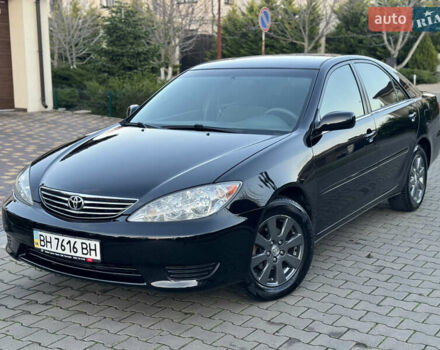 Чорний Тойота Камрі, об'ємом двигуна 2.36 л та пробігом 98 тис. км за 8700 $, фото 1 на Automoto.ua