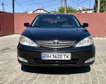 Чорний Тойота Камрі, об'ємом двигуна 2.4 л та пробігом 310 тис. км за 5000 $, фото 1 на Automoto.ua