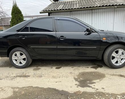 Чорний Тойота Камрі, об'ємом двигуна 2.4 л та пробігом 250 тис. км за 6500 $, фото 1 на Automoto.ua