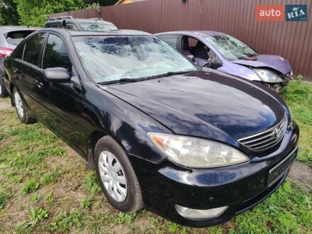 Черный Тойота Камри, объемом двигателя 2.4 л и пробегом 220 тыс. км за 2750 $, фото 1 на Automoto.ua