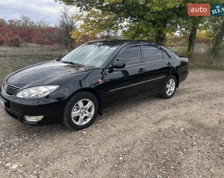 Чорний Тойота Камрі, об'ємом двигуна 2.36 л та пробігом 240 тис. км за 7500 $, фото 1 на Automoto.ua