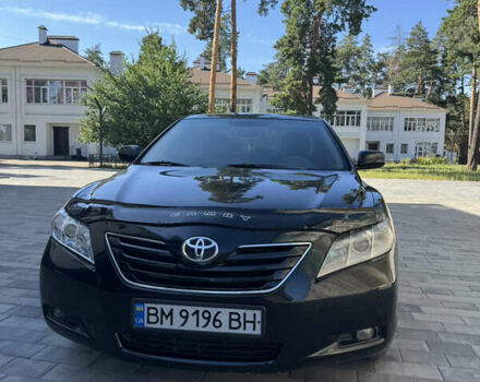 Чорний Тойота Камрі, об'ємом двигуна 2.4 л та пробігом 315 тис. км за 7100 $, фото 1 на Automoto.ua
