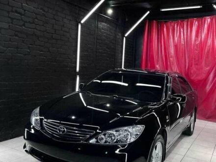 Черный Тойота Камри, объемом двигателя 2.36 л и пробегом 270 тыс. км за 6100 $, фото 1 на Automoto.ua