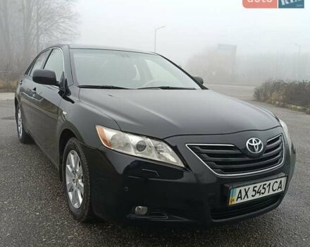 Черный Тойота Камри, объемом двигателя 3.46 л и пробегом 169 тыс. км за 10300 $, фото 1 на Automoto.ua