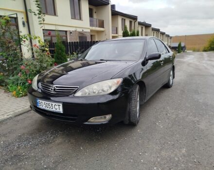 Чорний Тойота Камрі, об'ємом двигуна 2.4 л та пробігом 220 тис. км за 5800 $, фото 1 на Automoto.ua