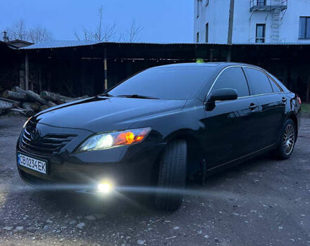 Черный Тойота Камри, объемом двигателя 3.46 л и пробегом 264 тыс. км за 9800 $, фото 1 на Automoto.ua