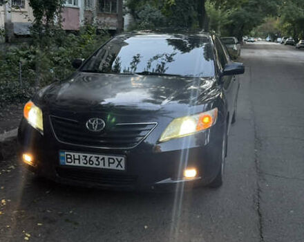 Черный Тойота Камри, объемом двигателя 2.36 л и пробегом 243 тыс. км за 6900 $, фото 1 на Automoto.ua