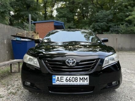 Черный Тойота Камри, объемом двигателя 2.4 л и пробегом 300 тыс. км за 7600 $, фото 1 на Automoto.ua