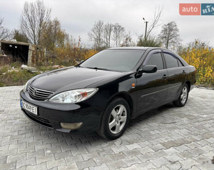 Чорний Тойота Камрі, об'ємом двигуна 2.36 л та пробігом 294 тис. км за 5100 $, фото 1 на Automoto.ua
