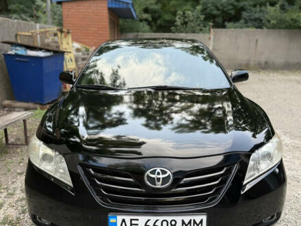 Черный Тойота Камри, объемом двигателя 2.36 л и пробегом 300 тыс. км за 7600 $, фото 1 на Automoto.ua