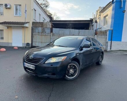 Черный Тойота Камри, объемом двигателя 3.5 л и пробегом 400 тыс. км за 5700 $, фото 1 на Automoto.ua