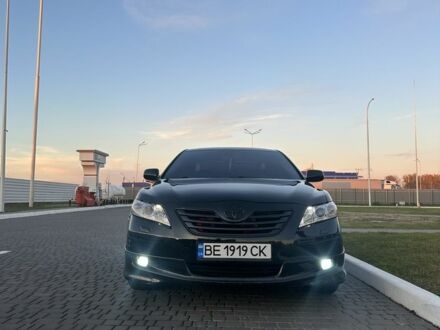 Черный Тойота Камри, объемом двигателя 2.4 л и пробегом 250 тыс. км за 8700 $, фото 1 на Automoto.ua