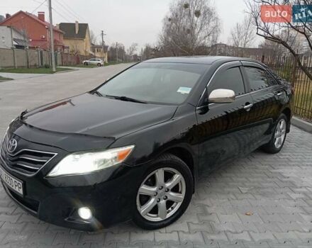 Чорний Тойота Камрі, об'ємом двигуна 2.4 л та пробігом 288 тис. км за 7700 $, фото 1 на Automoto.ua